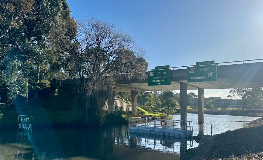 Modular floating pontoon installed for Sony film Thrash filming location in Melbourne with safety handrails and floating highway signage